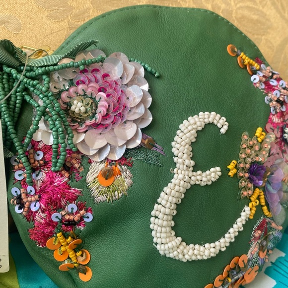 Anthropologie Handbags - Anthropologie small leather and sequins zippered bag. Letter E beaded on front.